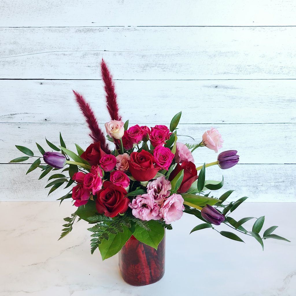Valentine's Day flowers; red roses; purple flowers